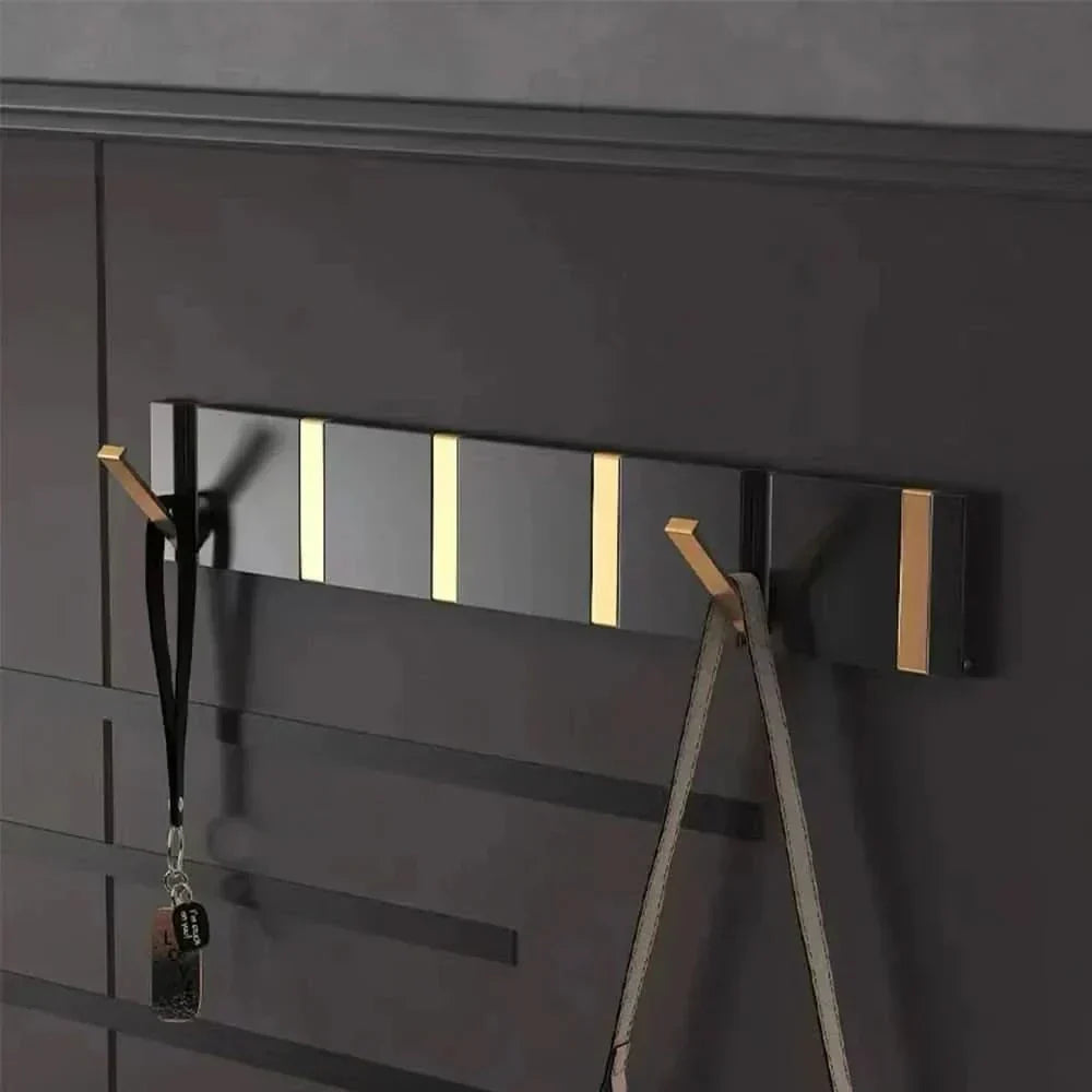 Stylish Stainless Steel Wall Hook – Foldable, Space-Saving Hanger for Bathroom and Living Areas
