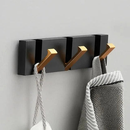 Stylish Stainless Steel Wall Hook – Foldable, Space-Saving Hanger for Bathroom and Living Areas – Gold